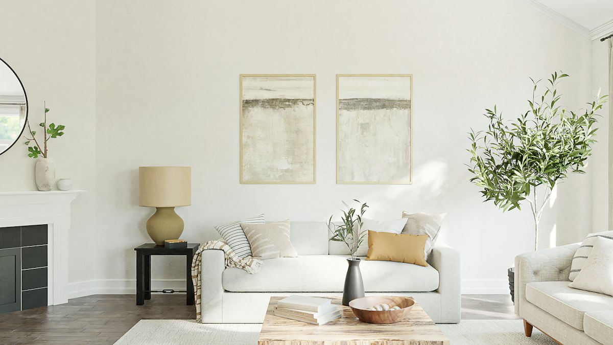 Tidy living room with a white sofa and fireplace